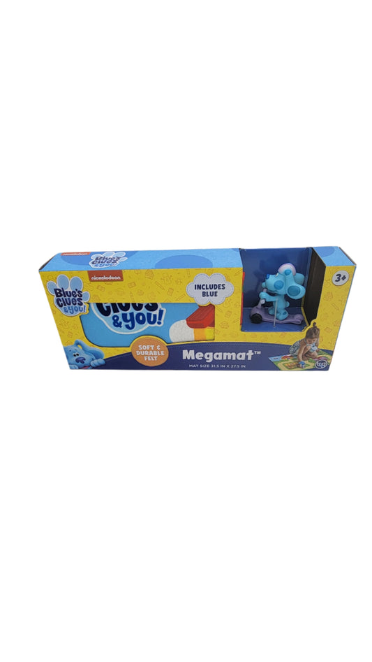 A toy package for the Blue Megamat, showcasing an image of Blue and including a small play mat. Suitable for ages 3 and up.