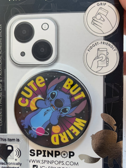 Introducing Pop Sockets Stitch, a pop-up phone grip featuring an animated character illustration and the text "Cute but Weird." The packaging emphasizes that this hand gripping accessory is fidget-friendly.