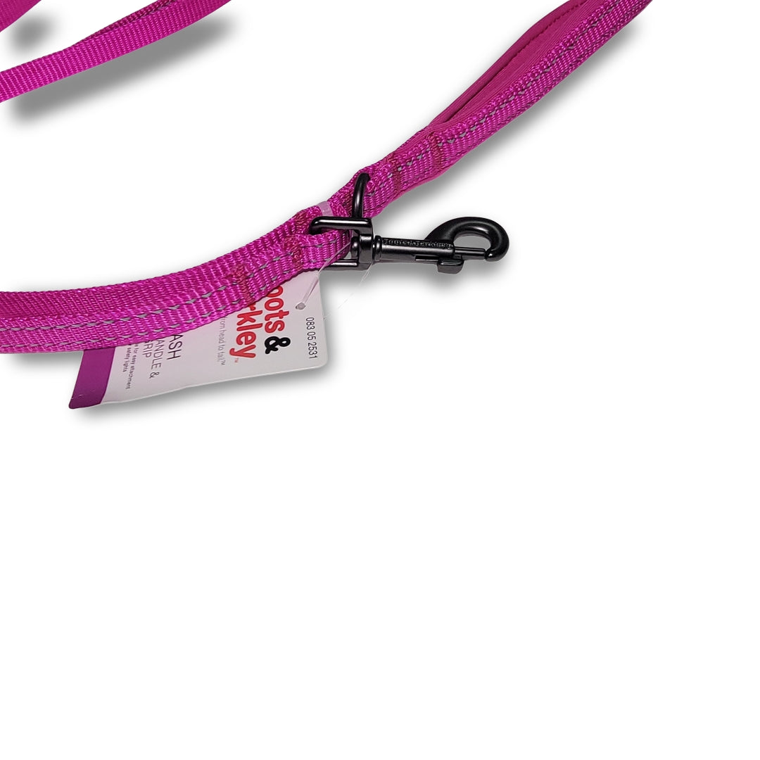 Close-up of a 6ft pink Boots & Barkley reflective dog leash with a metal clasp, designed to handle dogs up to 25lbs, featuring a visible product tag.