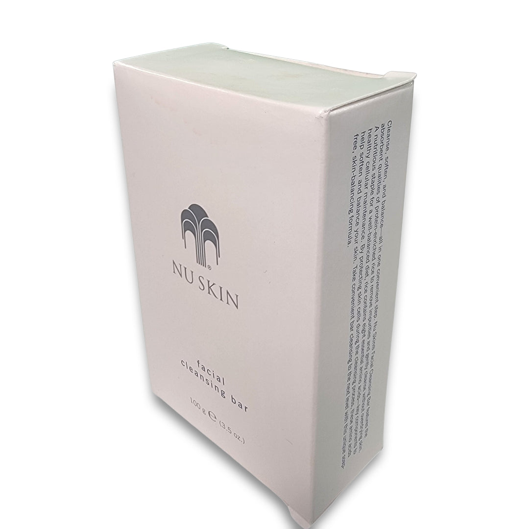 A white box labeled "NuSkin Bar" with product details on the side.