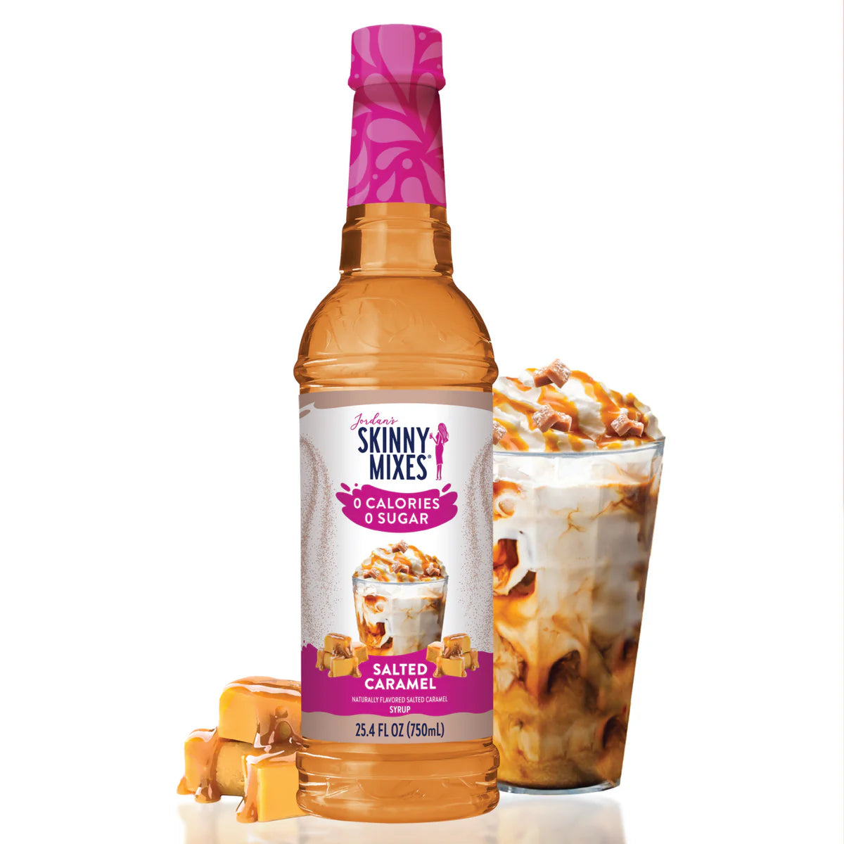 A bottle of Jordan's Skinny Syrup Salted Caramel, Sugar Free (25.4oz) next to a glass of iced coffee topped with caramel sauce and small caramel cubes.